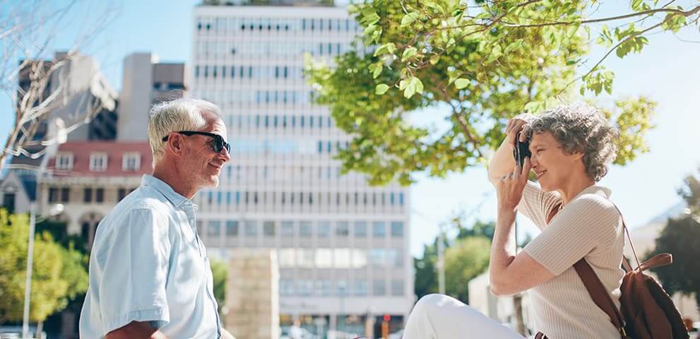 Couple on brunch photographing each other