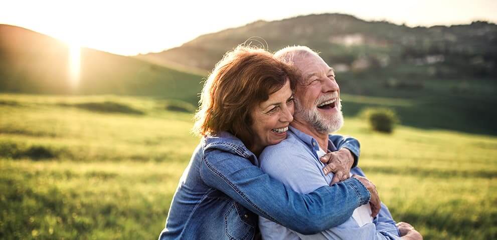 Older couple in field