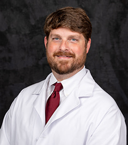 Dr. Garrett Webster